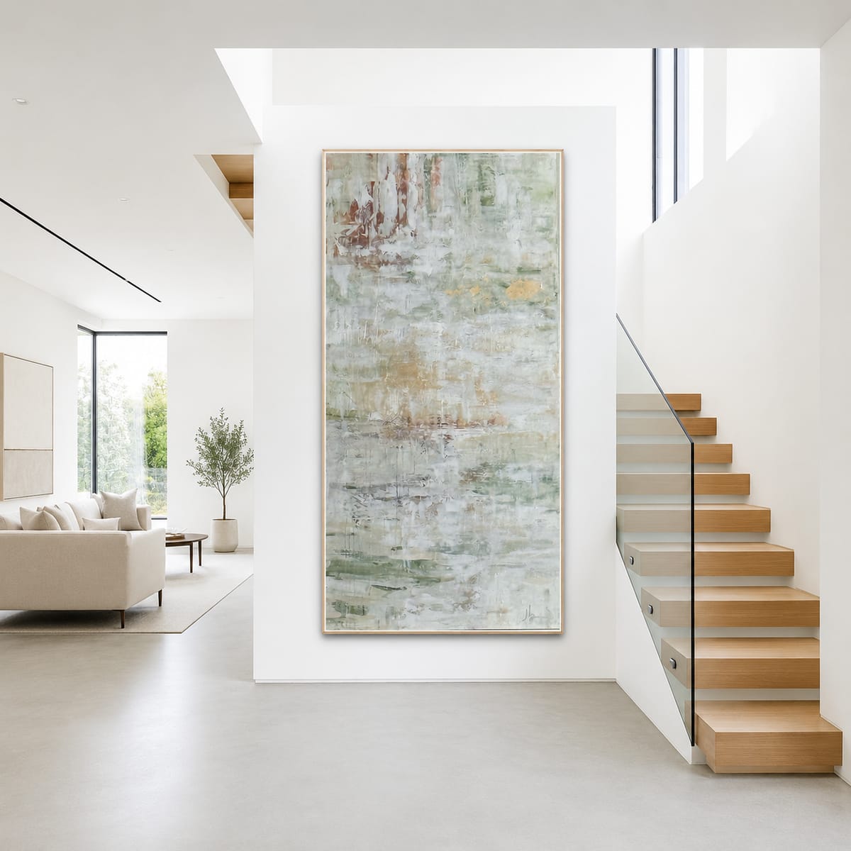 Tall sage and cream abstract painting by Jen Bell in a bright modern stairway.
